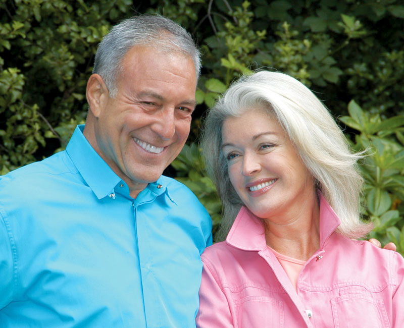 smiling senior couple with Dental Implants Center For Dental Excellence Dickson TN